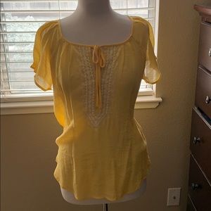 Yellow flowy top